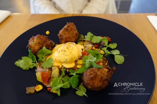 Sir Charles - Corn Fritters w. Poached Egg, Charred Salsa and Spicy Hollandaise ($16)