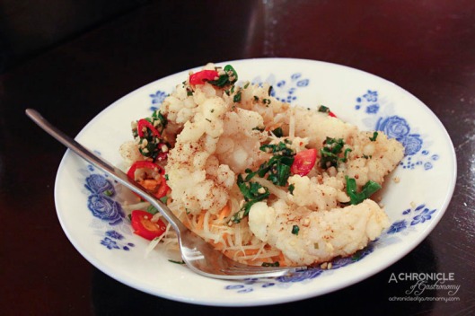 Masak Ku - Chilli and Szechuan Pepper Squid - Lightly Dusted and Spiced with Szechuan Pepper, Drizzled with Chilli Oil ($9.50)